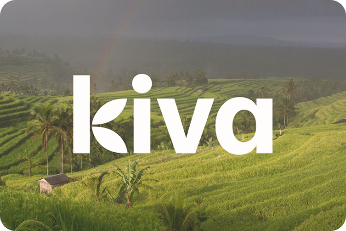 Kiva: terraced rice paddies with palms and a rainbow at the horizon