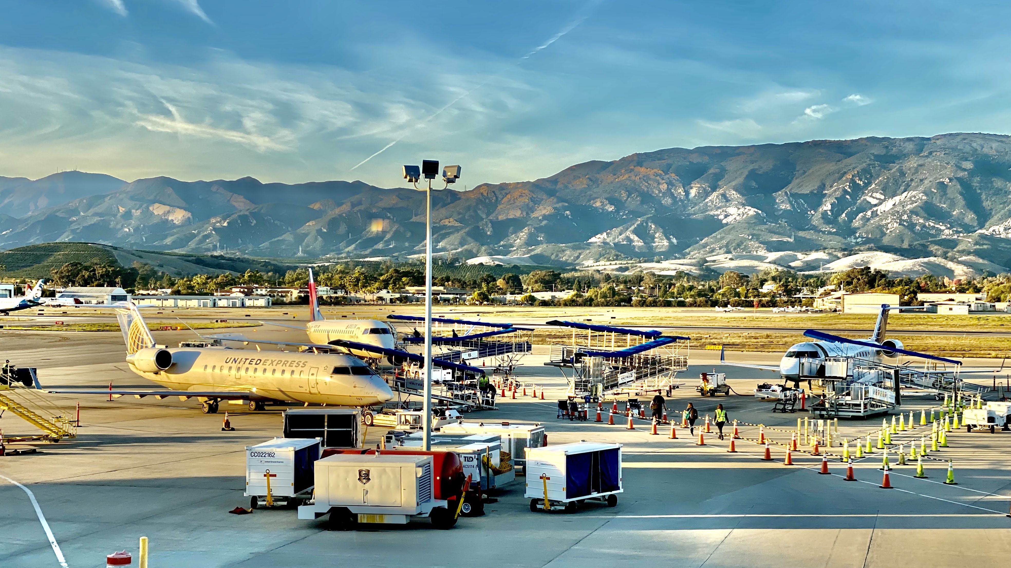 Santa Barbara Airport tarmac with mountains beyond.